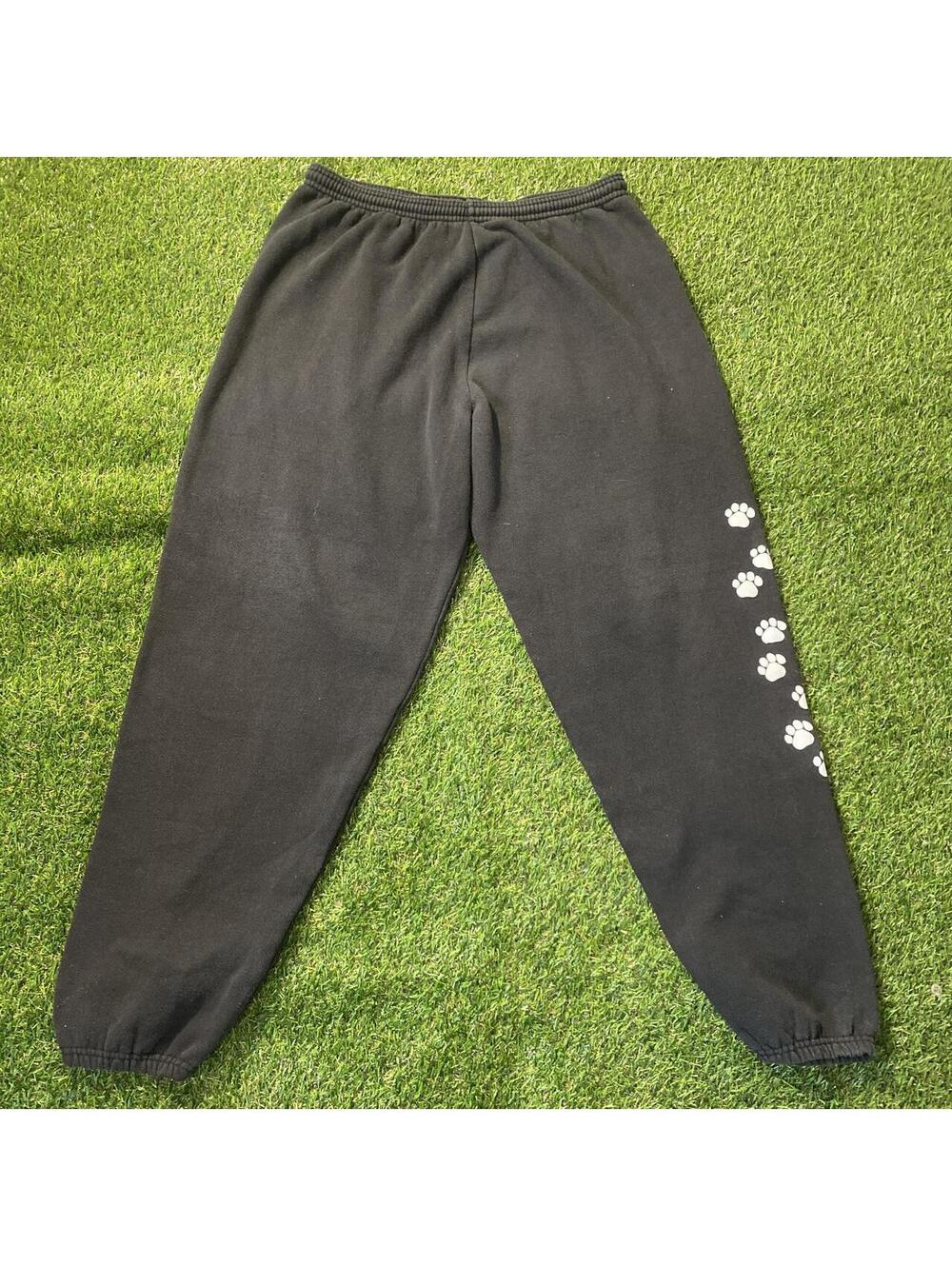 Vintage 90’s Lee Black sweatpants with white paw print design